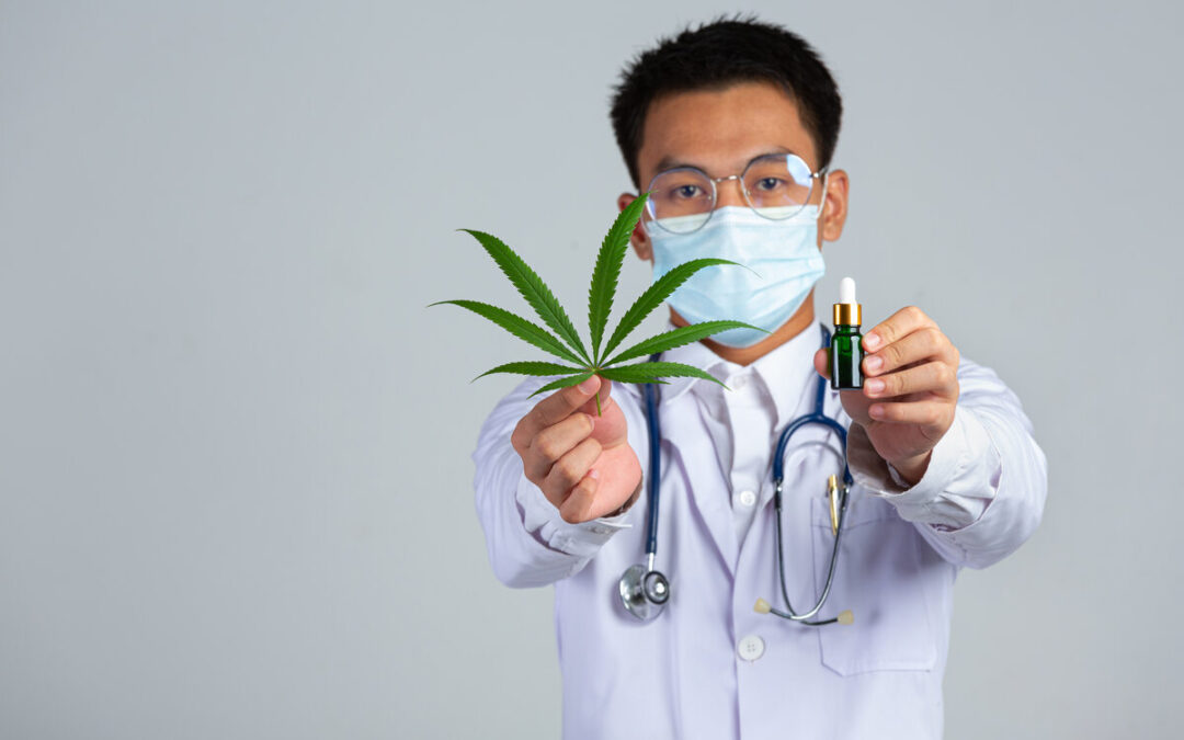 medical cannabis doctor holding cannabis bottle cannabis oil