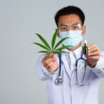 medical cannabis doctor holding cannabis bottle cannabis oil